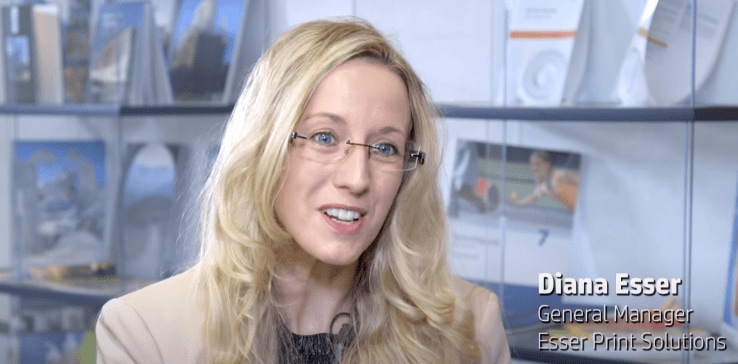 A person with long blonde hair wearing glasses A person with long blonde hair wearing glasses