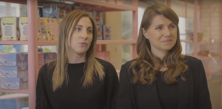 A couple of women in black shirts A couple of women in black shirts